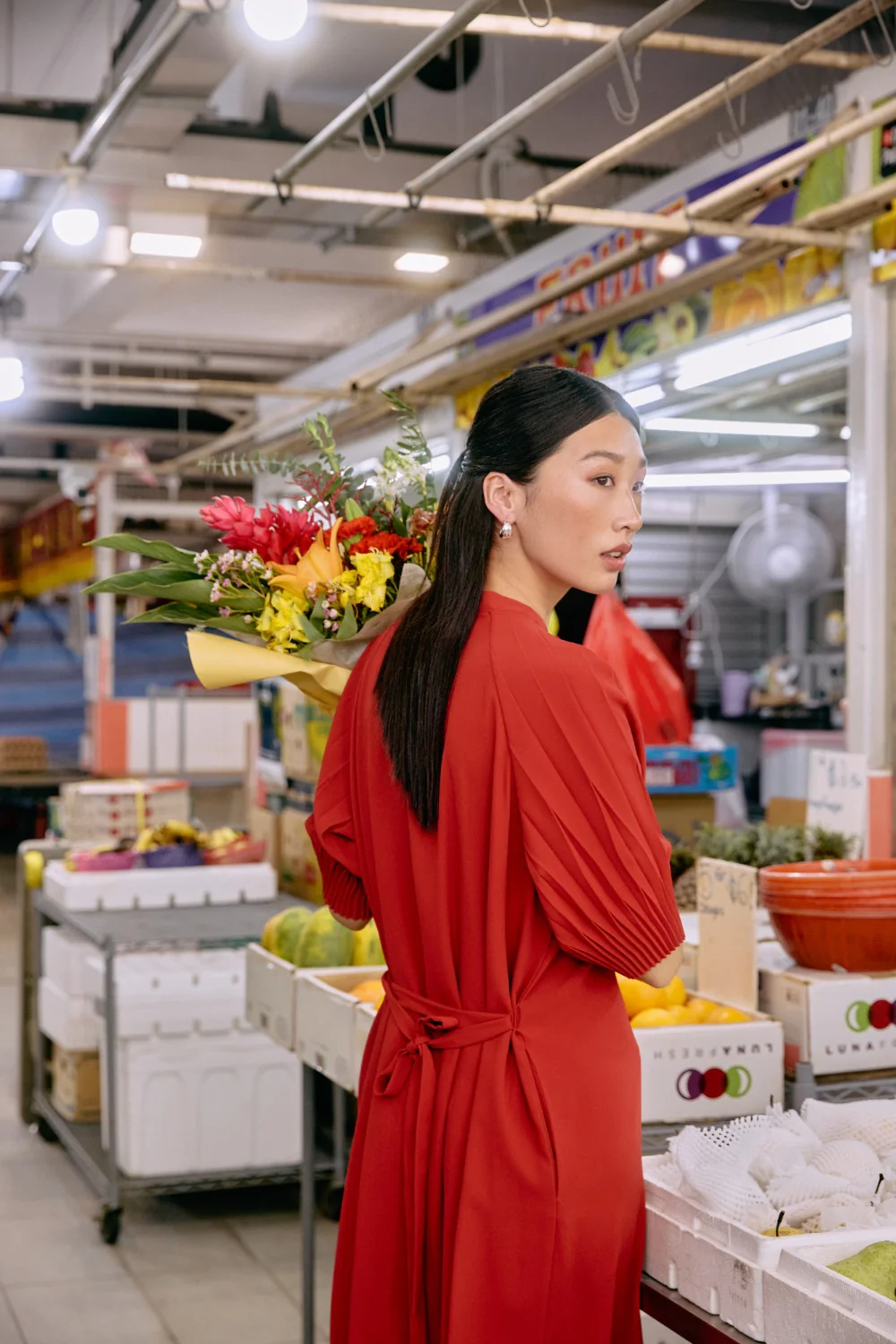 GINLEE red pleated dress showcasing fluid silhouette