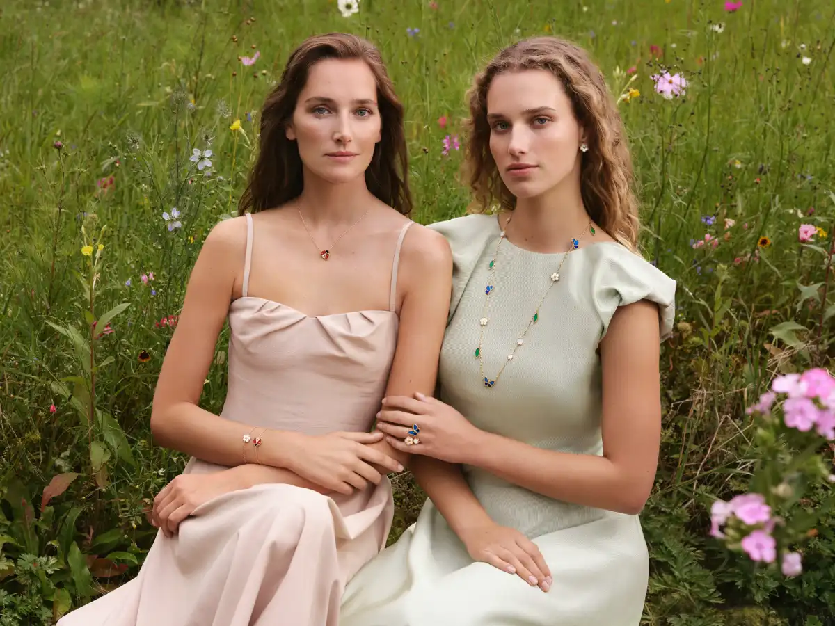 Lucky Spring campaign image featuring two models wearing Van Cleef & Arpels jewellery